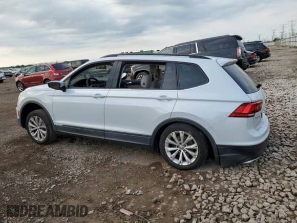 2018 Volkswagen Tiguan S with VIN 3VV1B7AX4JM071186, listed as a Copart auction lot 68552955 with 117,126 mi miles and Salvage title. Bid and sale history available at DreamBid. Image 2.