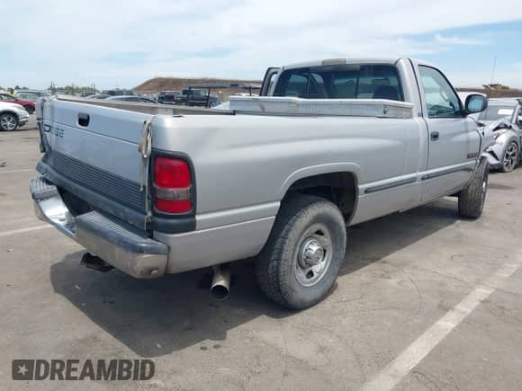 1999 Dodge RAM with VIN 3B7KC2665XM545187, listed as a IAAI auction lot 42643952 with 172,688 mi miles and . Bid and sale history available at DreamBid. Image 4.