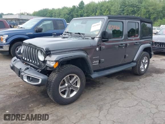 2021 Jeep Wrangler Unlimited Sahara Altitude with VIN 1C4HJXEG7MW776529, listed as a IAAI auction lot 42911866 with 51,748 mi miles and . Bid and sale history available at DreamBid. Image 17.