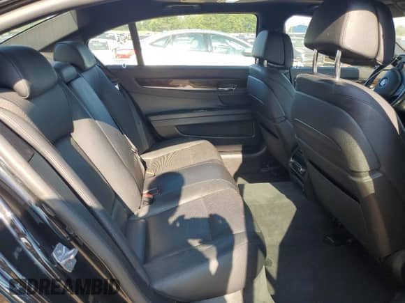 2014 BMW 7 Series 740Li с VIN WBAYE4C50ED137777, выставлен на аукционе Copart как лот 69148825 с пробегом 104 472 миль миль и Списание • Salvage title. История ставок и продаж доступна на DreamBid. Изображение 10.