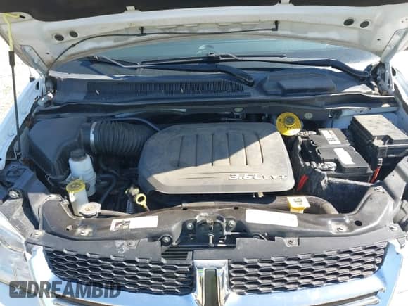 2015 Dodge Grand Caravan SE Plus with VIN 2C4RDGBG6FR653543, listed as a IAAI auction lot 41909408 with 69,669 mi miles and . Bid and sale history available at DreamBid. Image 10.