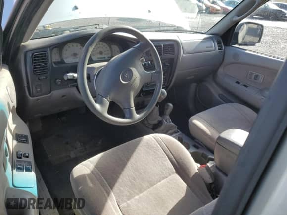 2001 Toyota Tacoma с VIN 5TEWN72N11Z840707, выставлен на аукционе Copart как лот 82088715 с пробегом 405 448 миль миль и Списание • Salvage title. История ставок и продаж доступна на DreamBid. Изображение 8.