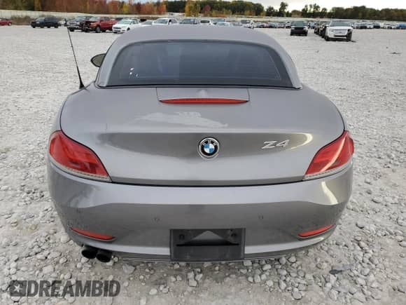 2013 BMW Z4 sDrive28i with VIN WBALL5C51DJ104731, listed as a Copart auction lot 75955854 with 77,108 mi miles and Salvage title. Bid and sale history available at DreamBid. Image 6.