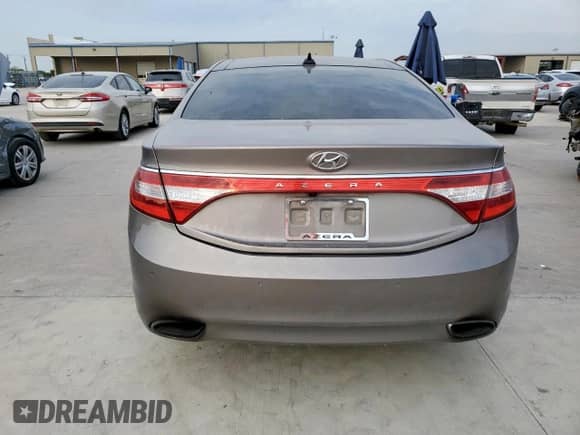 2012 Hyundai Azera z VIN KMHFH4JG2CA192389, wystawiony jako Copart lot #68006605 z przebiegiem 171 757 mil mil oraz Szkoda całkowita • Salvage title. Historia ofert i sprzedaży dostępna na DreamBid. Obrazek 6.