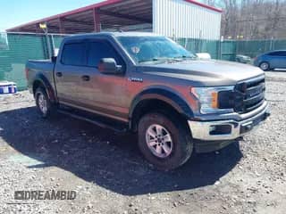 2018 Ford F-150 XL z VIN 1FTEW1EB3JFC30571, wystawiony jako IAAI lot #41728701 z przebiegiem 118 381 mil mil oraz . Historia ofert i sprzedaży dostępna na DreamBid. Obrazek 1.