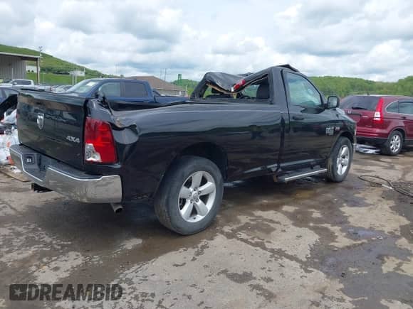 2021 Ram 1500 Tradesman with VIN 3C6JR7DT4MG704279, listed as a IAAI auction lot 42212201 with 21,528 mi miles and . Bid and sale history available at DreamBid. Image 4.