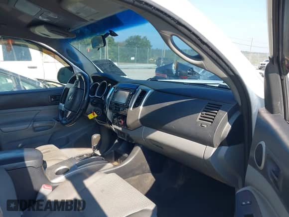 2015 Toyota Tacoma with VIN 5TFLU4EN2FX127927, listed as a IAAI auction lot 43277553 with 144,639 mi miles and . Bid and sale history available at DreamBid. Image 5.