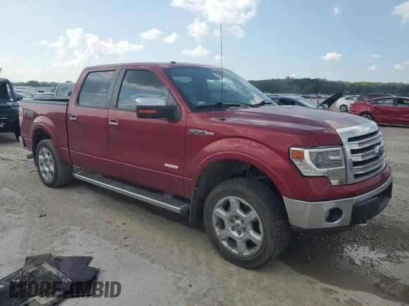 2013 Ford F-150 Lariat with VIN 1FTFW1ET7DKF18182, listed as a Copart auction lot 68183995 with 165,863 mi miles and Salvage title. Bid and sale history available at DreamBid. Image 4.