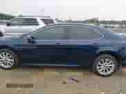 2021 Toyota Camry LE with VIN 4T1C11AK8MU548158, listed as a IAAI auction lot 43333222 with 34,824 mi miles and . Bid and sale history available at DreamBid. Image 15.