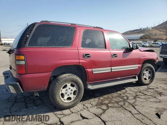 2004 Chevrolet Tahoe LS with VIN 1GNEC13T44R294049, listed as a Copart auction lot 59900565 with 149,379 mi miles and Salvage title. Bid and sale history available at DreamBid. Image 3.