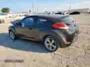 2015 Hyundai Veloster z VIN KMHTC6AD4FU245065, wystawiony jako Copart lot #68655815 z przebiegiem 120 922 mil mil oraz Szkoda całkowita • Salvage title. Historia ofert i sprzedaży dostępna na DreamBid. Obrazek 2.