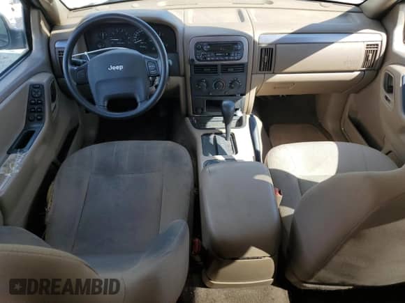 2004 Jeep Grand Cherokee Laredo with VIN 1J4GX48S64C302687, listed as a Copart auction lot 85599075 with 213,057 mi miles and Salvage title. Bid and sale history available at DreamBid. Image 8.