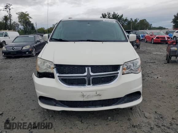 2012 Dodge Grand Caravan SXT with VIN 2C4RDGCG1CR154157, listed as a Copart auction lot 85591555 with 254,438 mi miles and Salvage title. Bid and sale history available at DreamBid. Image 5.