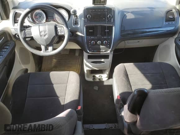 2014 Dodge Grand Caravan American Value with VIN 2C4RDGBG1ER100605, listed as a Copart auction lot 82104405 with 192,277 mi miles and Salvage title. Bid and sale history available at DreamBid. Image 8.