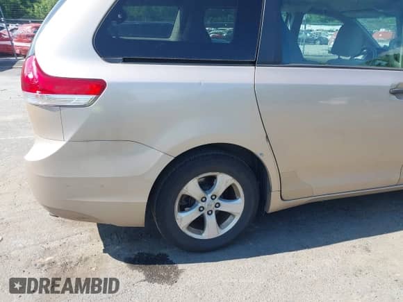 2014 Toyota Sienna L with VIN 5TDZK3DC6ES497292, listed as a IAAI auction lot 42634167 with 211,769 mi miles and . Bid and sale history available at DreamBid. Image 20.