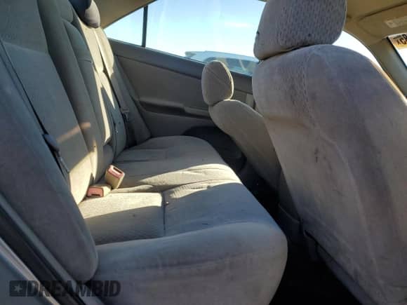 2002 Toyota Camry LE z VIN 4T1BE32K82U588621, wystawiony jako Copart lot #86985085 z przebiegiem 252 745 mil mil oraz Szkoda całkowita • Salvage title. Historia ofert i sprzedaży dostępna na DreamBid. Obrazek 10.