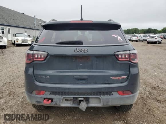 2017 Jeep Compass Trailhawk with VIN 3C4NJDDBXHT688190, listed as a Copart auction lot 63299085 with 104,758 mi miles and Clean title. Bid and sale history available at DreamBid. Image 6.