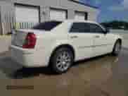 2010 Chrysler 300 Touring Signature with VIN 2C3CA5CV9AH119519, listed as a Copart auction lot 67221465 with 209,385 mi miles and Salvage title. Bid and sale history available at DreamBid. Image 3.