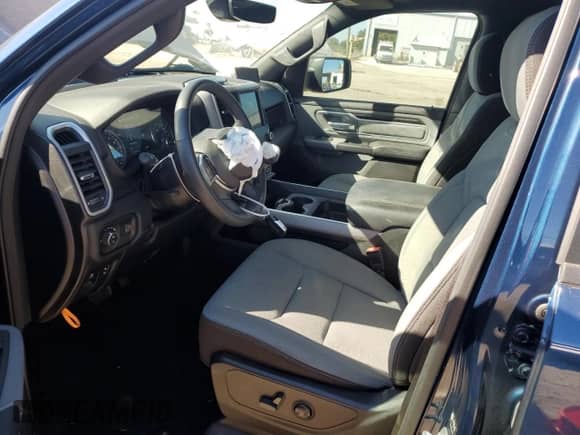 2023 Ram 1500 Lone Star z VIN 1C6RREBT9PN545443, wystawiony jako Copart lot #86347544 z przebiegiem 33 934 mil mil oraz Nie do naprawy • Non repairable. Historia ofert i sprzedaży dostępna na DreamBid. Obrazek 7.