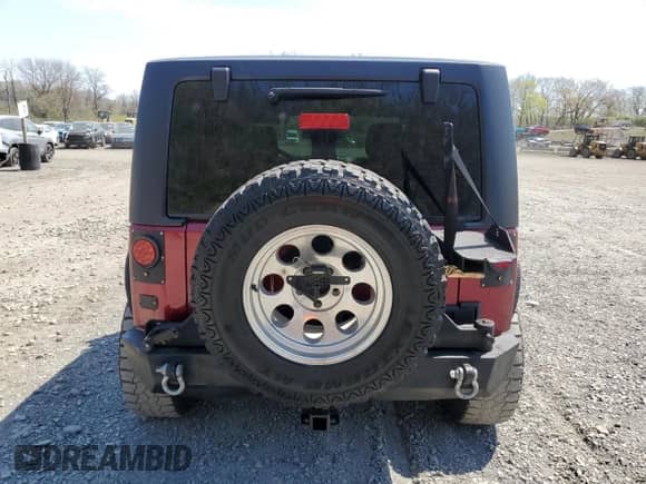 2012 Jeep Wrangler Sport with VIN 1C4AJWAG7CL105511, listed as a Copart auction lot 54671835 with 137,362 mi miles and Clean title. Bid and sale history available at DreamBid. Image 6.