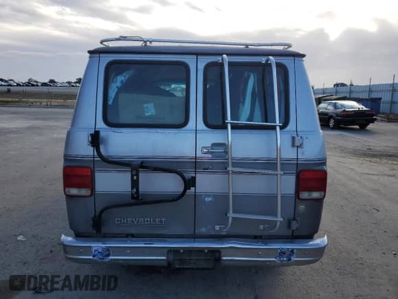 1991 Chevrolet Sportvan с VIN 1GBEG25K1M7126120, выставлен на аукционе Copart как лот 86338185 с пробегом 255 060 миль миль и Списание • Salvage title. История ставок и продаж доступна на DreamBid. Изображение 6.