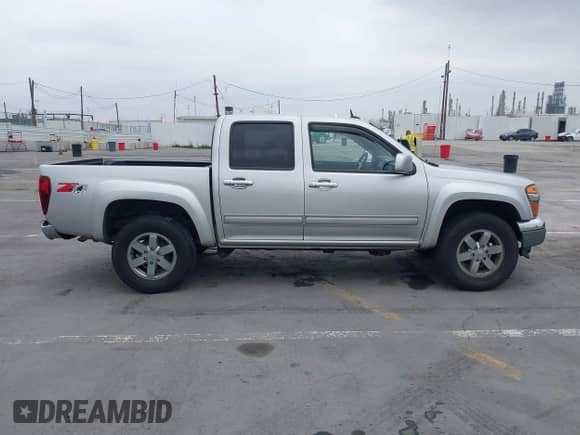 2012 Chevrolet Colorado 2LT z VIN 1GCHTDFE2C8118948, wystawiony jako IAAI lot #42174132 z przebiegiem 145 256 mil mil oraz . Historia ofert i sprzedaży dostępna na DreamBid. Obrazek 13.