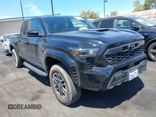 2024 Toyota Tacoma SR5 with VIN 3TYLB5FNXRT001288, listed as a IAAI auction lot 43045960 with 35,743 mi miles and . Bid and sale history available at DreamBid. Image 1.