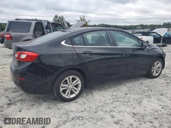 2019 Chevrolet Cruze LT с VIN 1G1BE5SM5K7146047, выставлен на аукционе Copart как лот 84614035 с пробегом 31 056 миль миль и Списание • Salvage title. История ставок и продаж доступна на DreamBid. Изображение 3.