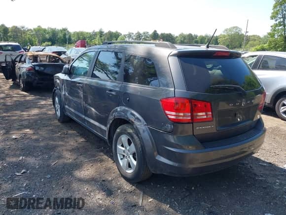2016 Dodge Journey SE with VIN 3C4PDCAB3GT115239, listed as a IAAI auction lot 42412448 with 56,943 mi miles and . Bid and sale history available at DreamBid. Image 3.