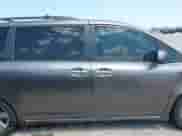 2014 Toyota Sienna SE with VIN 5TDXK3DC7ES487541, listed as a IAAI auction lot 42998929 with 214,475 mi miles and . Bid and sale history available at DreamBid. Image 14.