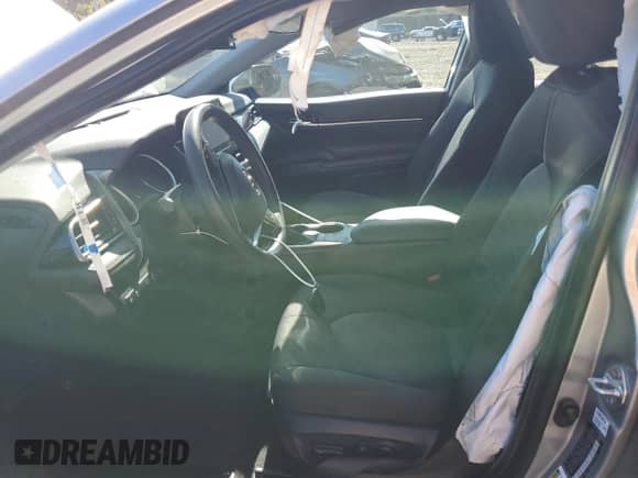 2023 Toyota Camry LE z VIN 4T1C11AK3PU797987, wystawiony jako Copart lot #87260595 z przebiegiem 28 172 mil mil oraz Szkoda całkowita • Salvage title. Historia ofert i sprzedaży dostępna na DreamBid. Obrazek 7.