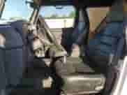 1999 Jeep Wrangler Sport with VIN 1J4FY19SXXP412760, listed as a Copart auction lot 84983895 with 180,172 mi miles and Clean title. Bid and sale history available at DreamBid. Image 7.