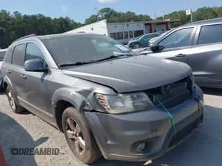 2012 Dodge Journey SXT with VIN 3C4PDCBG8CT220461, listed as a IAAI auction lot 43284185 with 265,254 mi miles and . Bid and sale history available at DreamBid. Image 1.