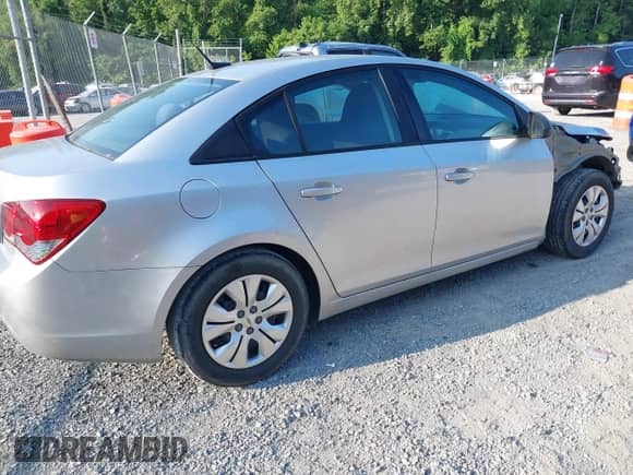 2014 Chevrolet Cruze LS with VIN 1G1PB5SG2E7272993, listed as a IAAI auction lot 42582987 with 156,816 mi miles and . Bid and sale history available at DreamBid. Image 4.