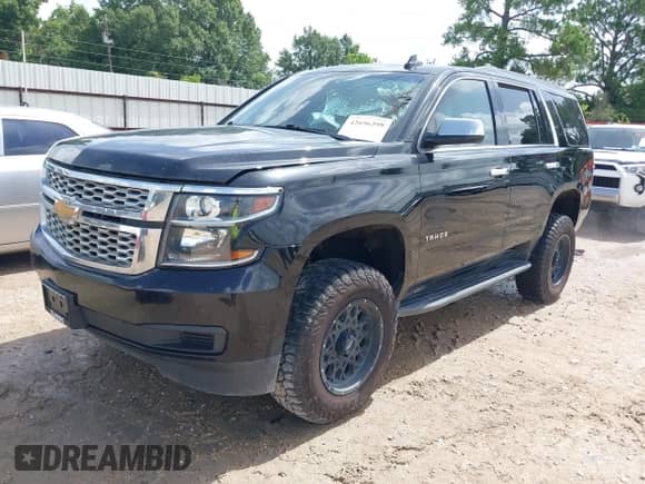 2019 Chevrolet Tahoe LS with VIN 1GNSKAKC0KR359757, listed as a IAAI auction lot 42696398 with Not provided miles and . Bid and sale history available at DreamBid. Image 2.