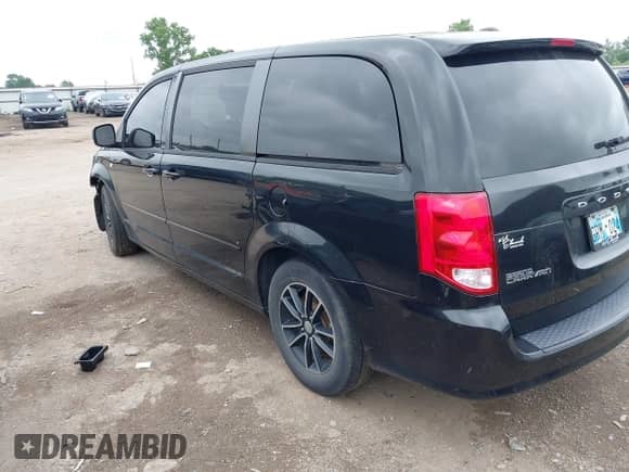 2014 Dodge Grand Caravan American Value with VIN 2C4RDGBG7ER463314, listed as a IAAI auction lot 42432986 with 155,664 mi miles and . Bid and sale history available at DreamBid. Image 3.