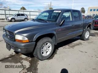 2002 Dodge Dakota Sport with VIN 1B7HL38N72S715327, listed as a Copart auction lot 46477865 with 225,619 mi miles and Salvage title. Bid and sale history available at DreamBid. Image 1.