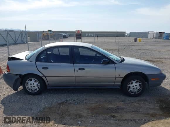 1998 Saturn SL с VIN 1G8ZH5281WZ175176, выставлен на аукционе IAAI как лот 41991139 с пробегом 214 374 миль миль и . История ставок и продаж доступна на DreamBid. Изображение 13.