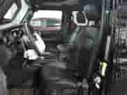 2023 Jeep Wrangler Sahara Altitude with VIN 1C4HJXEG9PW595565, listed as a Copart auction lot 77230394 with 28,477 mi miles and Salvage title. Bid and sale history available at DreamBid. Image 7.