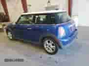 2013 MINI Hardtop with VIN WMWSU3C54DT686969, listed as a Copart auction lot 62160145 with 100,636 mi miles and Clean title. Bid and sale history available at DreamBid. Image 2.