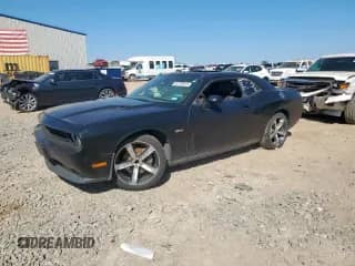 2014 Dodge Challenger SXT с VIN 2C3CDYAG4EH218073, выставлен на аукционе Copart как лот 82170815 с пробегом 199 611 миль миль и Списание • Salvage title. История ставок и продаж доступна на DreamBid. Изображение 1.