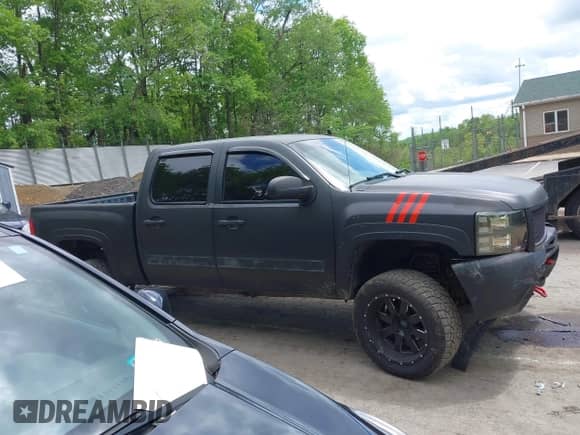 2011 Chevrolet Silverado 1500 LS z VIN 3GCPKREA3BG268473, wystawiony jako IAAI lot #42248752 z przebiegiem 202 057 mil mil oraz . Historia ofert i sprzedaży dostępna na DreamBid. Obrazek 13.