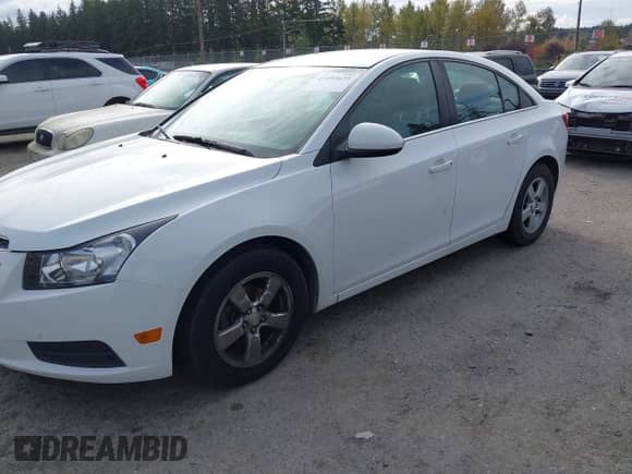 2014 Chevrolet Cruze 1LT с VIN 1G1PC5SB8E7477123, выставлен на аукционе IAAI как лот 43490639 с пробегом 149 603 миль миль и . История ставок и продаж доступна на DreamBid. Изображение 6.