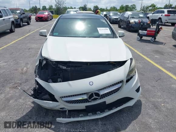 2015 Mercedes-Benz CLA 250 with VIN WDDSJ4GB6FN184799, listed as a IAAI auction lot 42393688 with 104,751 mi miles and . Bid and sale history available at DreamBid. Image 6.