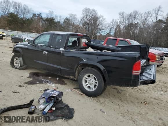 2002 Dodge Dakota с VIN 1B7GL12X52S669183, выставлен на аукционе Copart как лот 89385785 с пробегом 115 026 миль миль и Списание • Salvage title. История ставок и продаж доступна на DreamBid. Изображение 2.