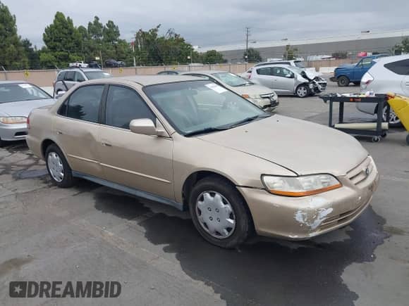 2001 Honda Accord LX with VIN 1HGCG56441A140971, listed as a IAAI auction lot 43416644 with 159,541 mi miles and . Bid and sale history available at DreamBid. Image 1.
