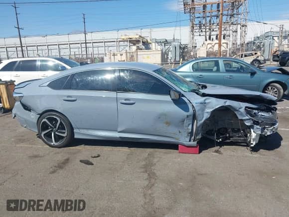 2022 Honda Accord Sport z VIN 1HGCV3F23NA022442, wystawiony jako IAAI lot #43353411 z przebiegiem Nie podano mil oraz . Historia ofert i sprzedaży dostępna na DreamBid. Obrazek 14.