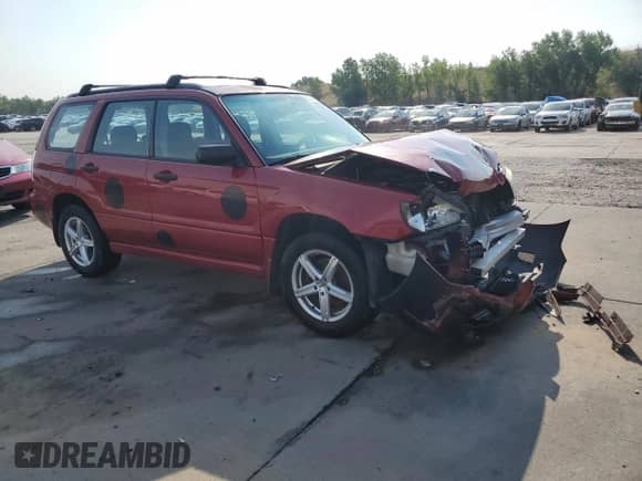 2007 Subaru Forester X with VIN JF1SG63647G735675, listed as a Copart auction lot 67308135 with 167,438 mi miles and Salvage title. Bid and sale history available at DreamBid. Image 4.