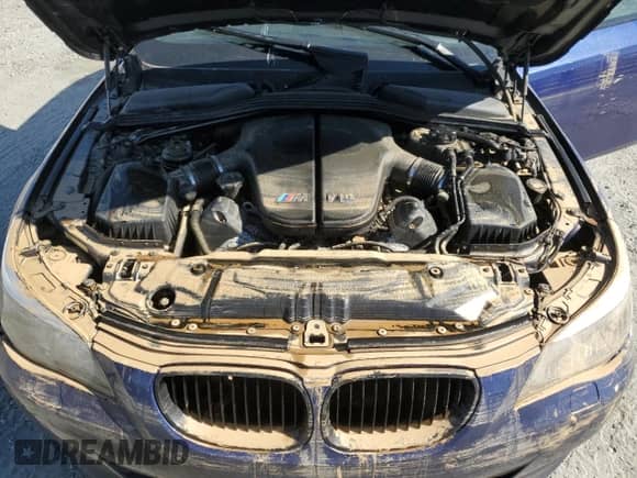 2008 BMW 5 Series M5 с VIN WBSNB93518CX08479, выставлен на аукционе Copart как лот 76824754 с пробегом Не указан миль и Списание • Salvage title. История ставок и продаж доступна на DreamBid. Изображение 11.