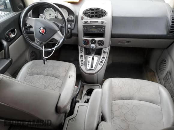 2005 Saturn VUE z VIN 5GZCZ534X5S864627, wystawiony jako Copart lot #68560504 z przebiegiem 192 156 mil mil oraz Czysty tytuł • Clean title. Historia ofert i sprzedaży dostępna na DreamBid. Obrazek 8.